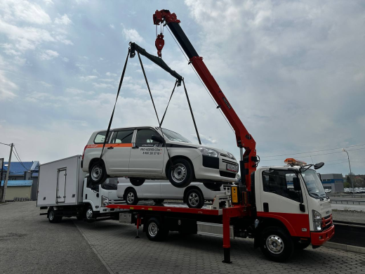 Эвакуаторная платформа 4.5 т с КМУ 3.2 т на шасси Isuzu Elf