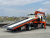Эвакуаторная платформа 4.5 т с КМУ 3.2 т на шасси Isuzu Elf